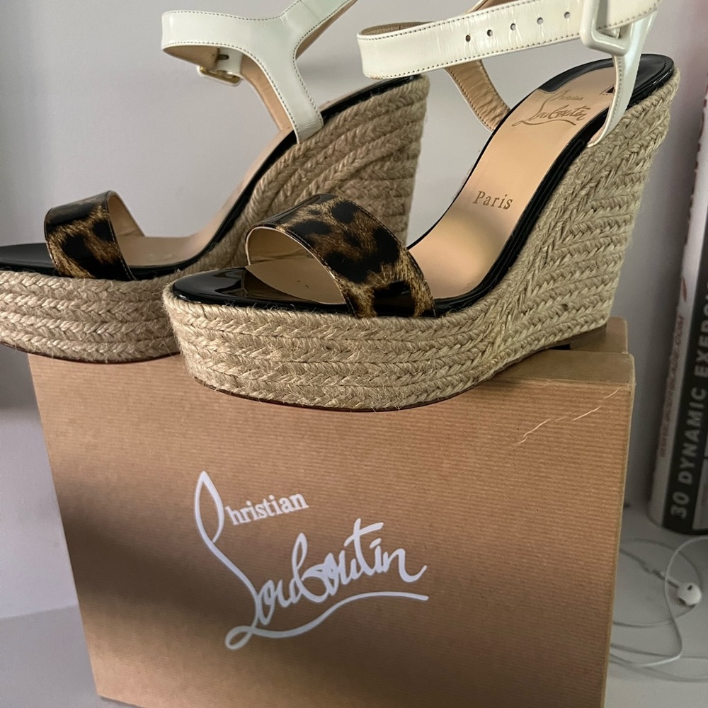 Christian louboutin wedges shoes .